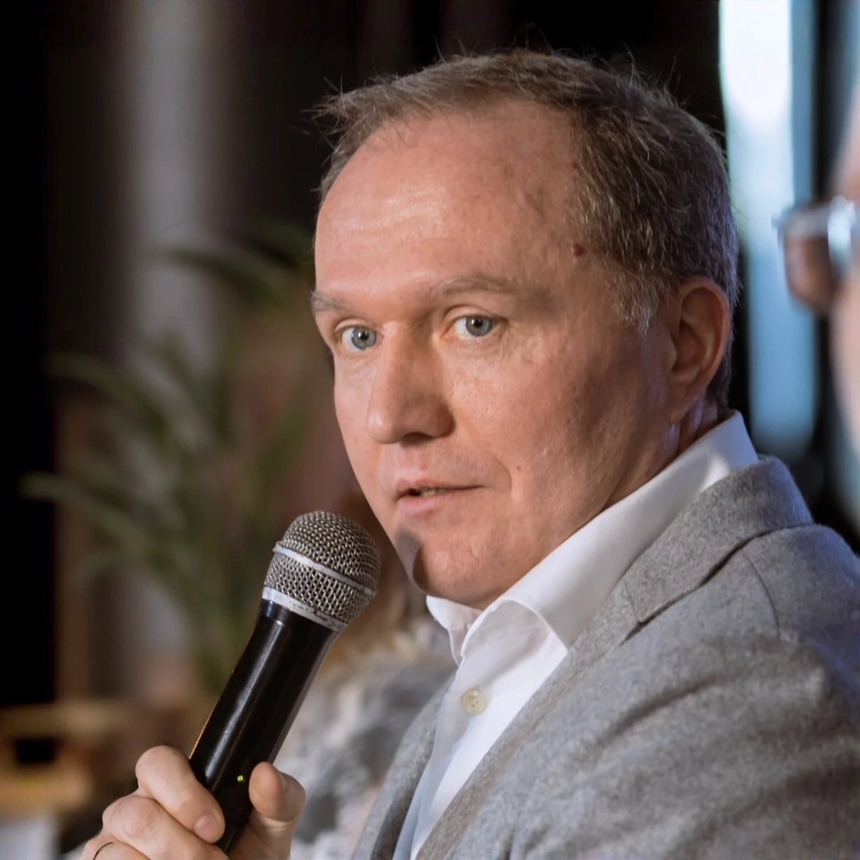 Alexey Podryabinnikov with a microphone
